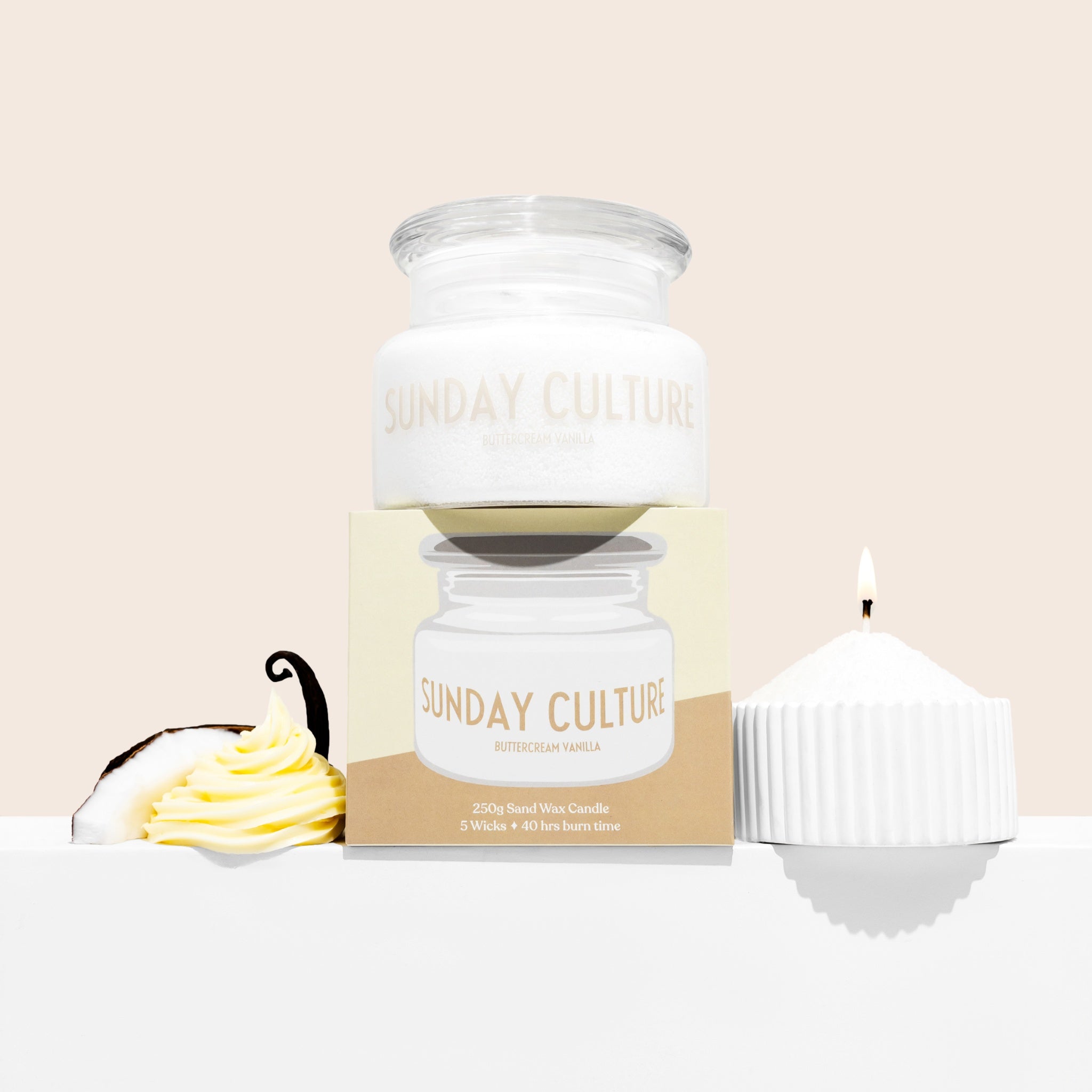 Sunday Culture candle with packaging on a beige background