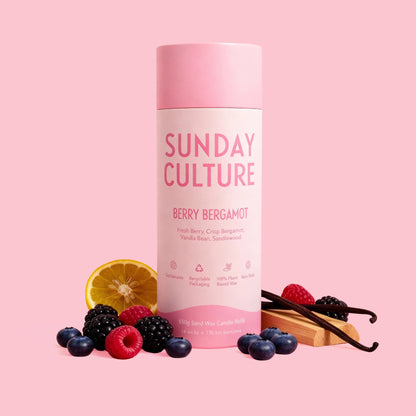 Sunday Culture berry bergamot product with fruits and vanilla beans on a pink background